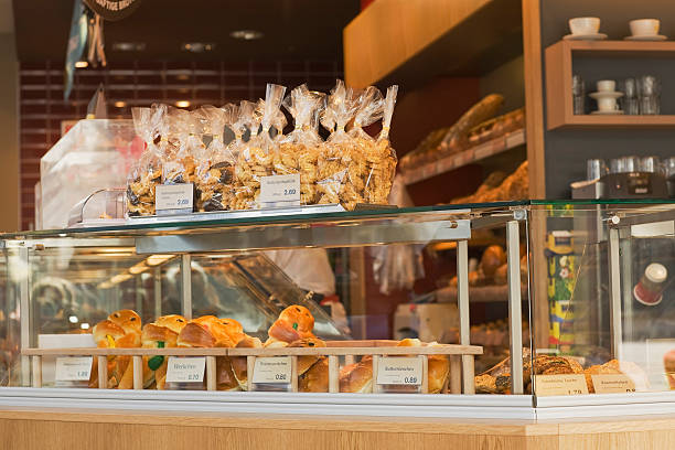 istock Glass window counter with bakery items and pastries 92027542