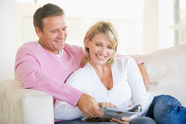 istock Couple relaxing with a magazine 92027848