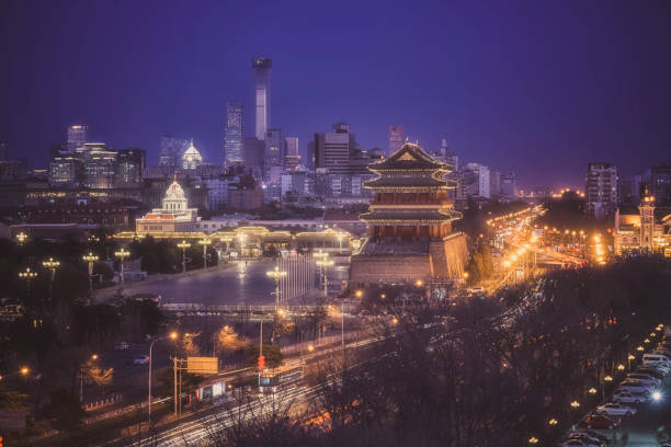 istock Ancient Chinese architecture with new beijing skyline by night 920281016