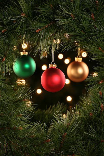 Christmas ornaments hanging in the center of a wreath Christmas Decorations Scene Slective Focus stock pictures, royalty-free photos & images