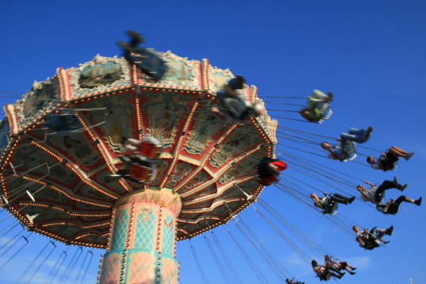 istock Merry-Go-Round swinging guests in the air 92029294