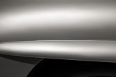 Part of the rear fender of vintage luxury car close up. Black and white colors