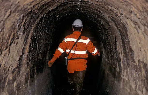 Photo of working in sewers