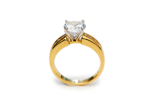 istock Golden ring with diamond isolated on the white 92030236