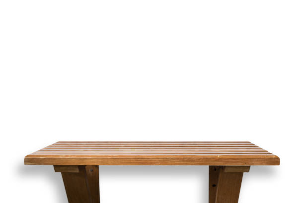 istock Empty top of wooden shelf isolated on white background 920307044