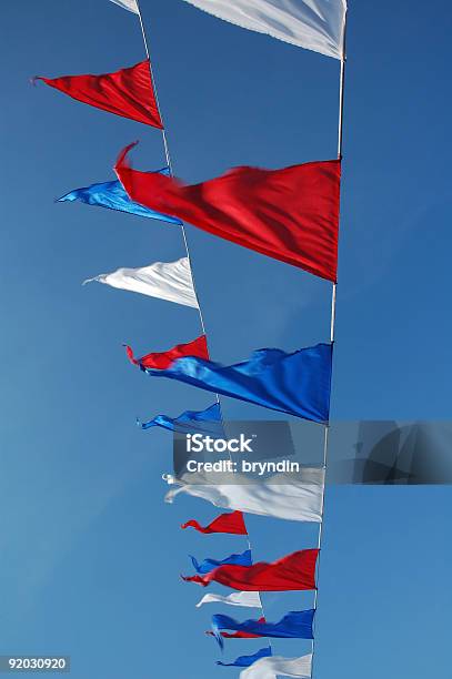 Agitando Flags Foto de stock y más banco de imágenes de Acontecimiento - Acontecimiento, Aire libre, Azul