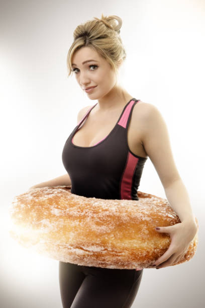 istock large donut around woman 920310164
