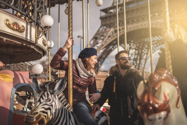 istock Friends having fun on Carousel at Paris 920315178
