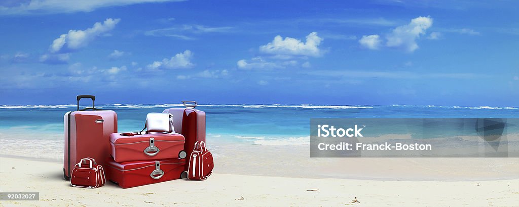 Red Luggage at the beach  Elegance Stock Photo