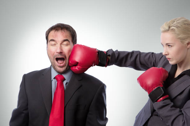 istock business man punch to the head 920329276