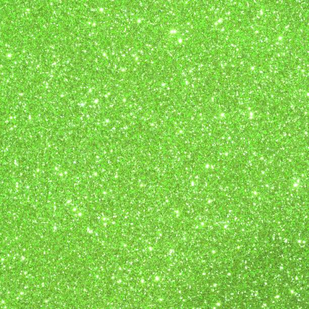 Green shimmering background with glittering lights a