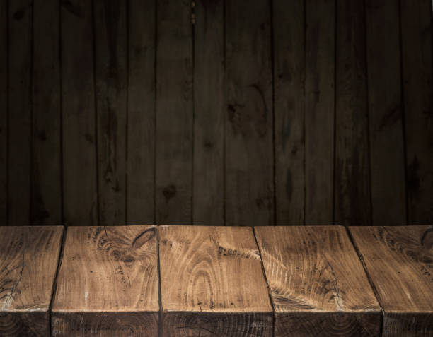 istock Old wooden tabletop and wooden wall. 920331858