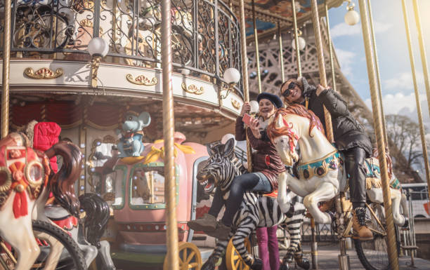 istock Best friends having fun on Carousel 920331912