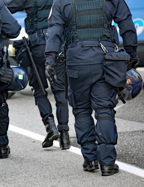 istock police in riot gear with protective helmet 920332266