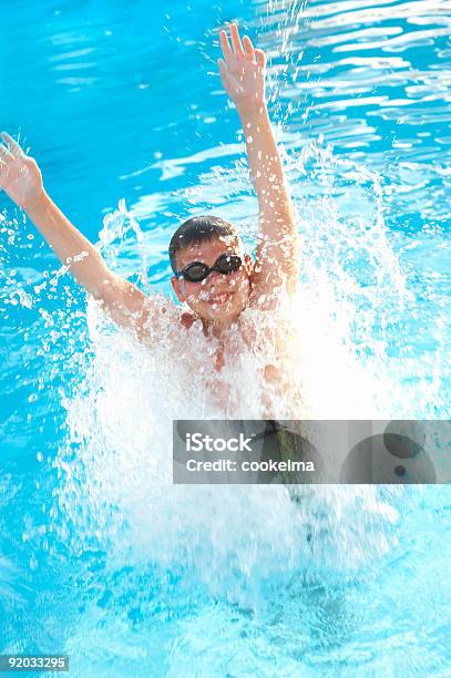 Jump In Water Stock Photo - Download Image Now - Blue, Boys, Child