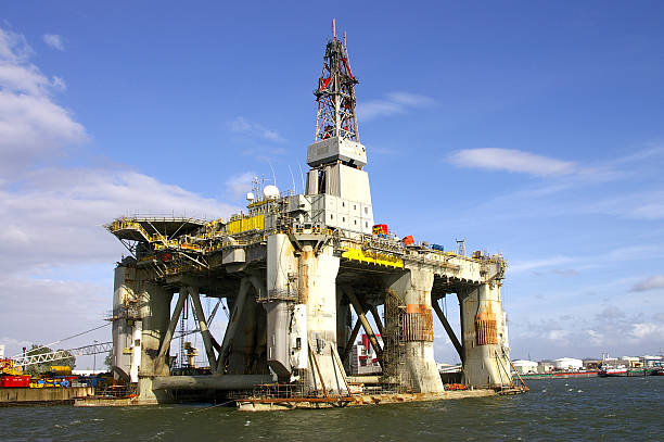 Deep sea drill rig in shipyard stock photo