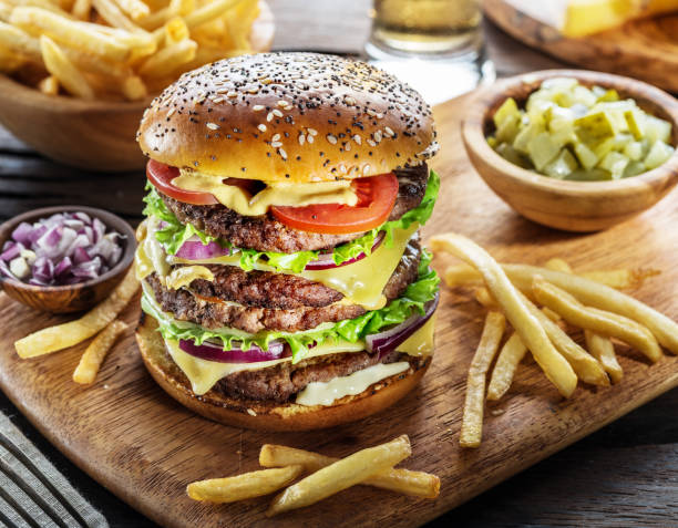 istock Big hamburger and French fries. 920339088