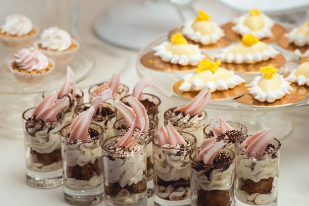istock Cute candy bar with various candies and cakes. Wedding sweets 920339226