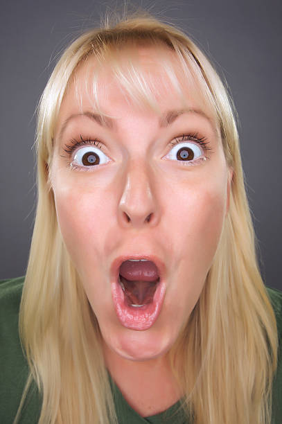 istock Shocked Blond Woman with Funny Face 92033931