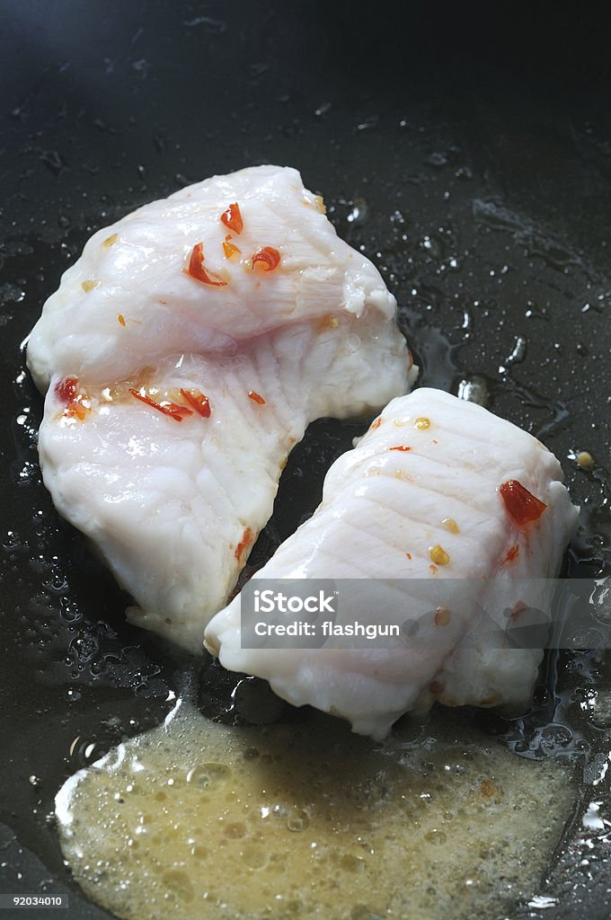 モンク魚 frying の炒め物 - みずみずしいのロイヤリティフリーストックフォト