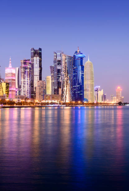 istock The Downtown Doha City Skyline Illuminated at Twilight Qatar 920342318