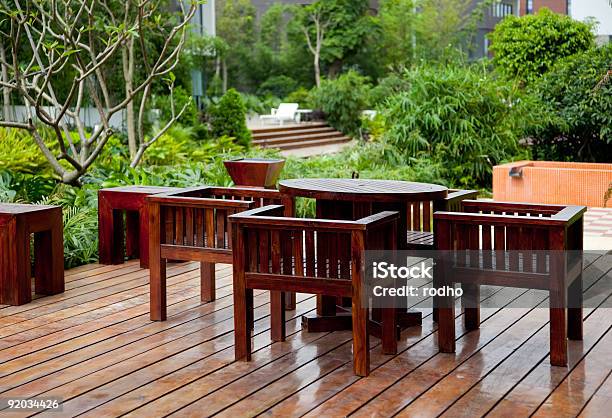 House Patio With Table And Chairs Stock Photo - Download Image Now - Deck Chair, Ornamental Garden, Architecture