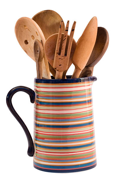 Jug and kitchen utensils stock photo