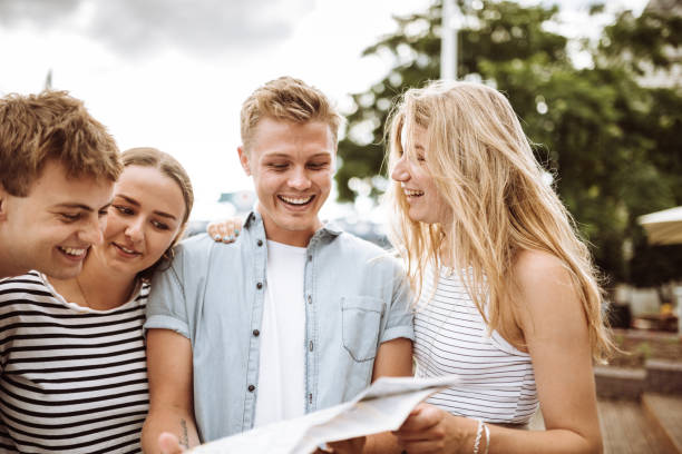 istock group of people happiness at tower bridge 920344984