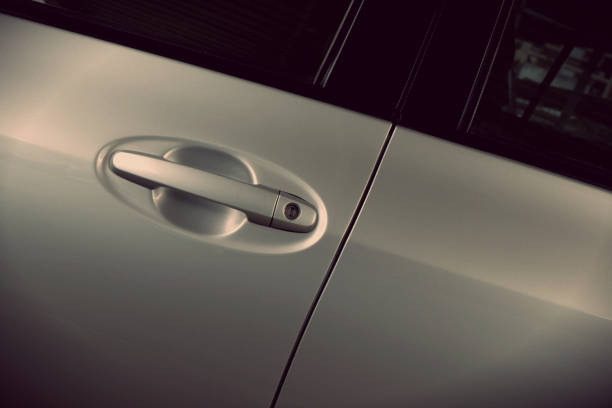 istock Handle of a silver car door 920345584