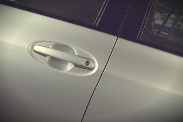 istock Handle of a silver car door 920345602