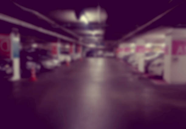 istock Abstract blur cars parking with bokeh light Background for use a 920345692