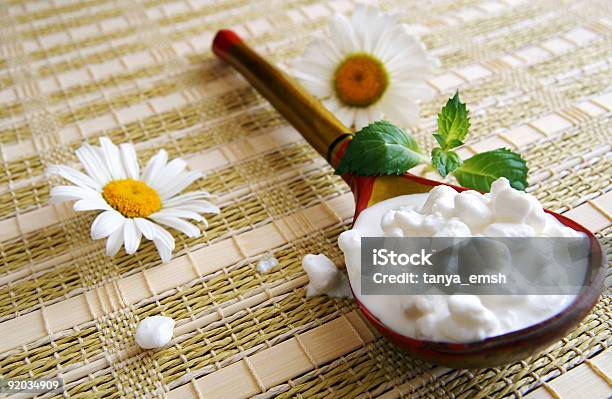 Wooden Spoon With Cottage Cheese Stock Photo - Download Image Now - Bedding, Breakfast, Chamomile