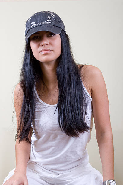 istock black hair young woman in cap 92035156