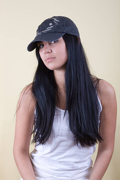 istock black hair young woman in cap 92035174