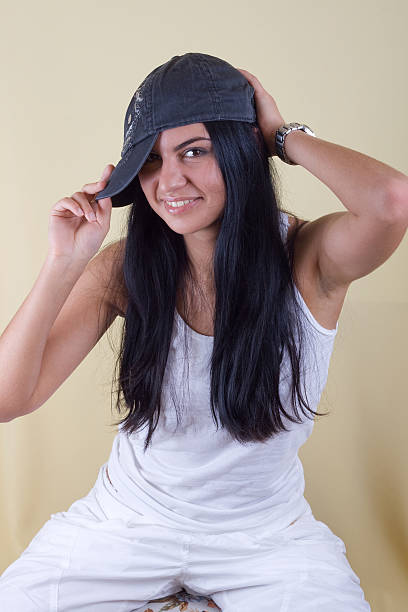 istock black hair young woman in cap 92035181