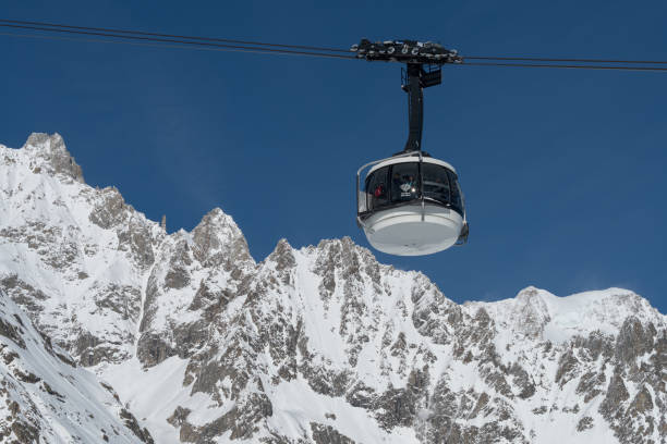 Courmayeur, Italy - January 23, 2018: The cable car (Skyway Monte Bianco) on the Italian side of Mont Blanc massif. The Skyway connects the city of Courmayeur to Pointe Helbronner (3,466 m)