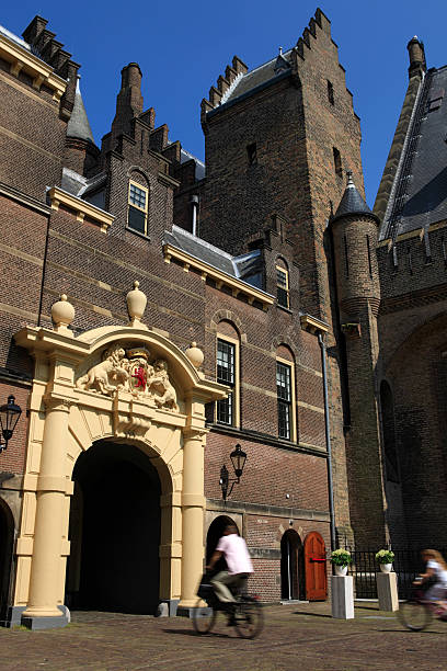 istock cyclists passing The Hague's Middle or Inner Gate at Binnenhof 92035553