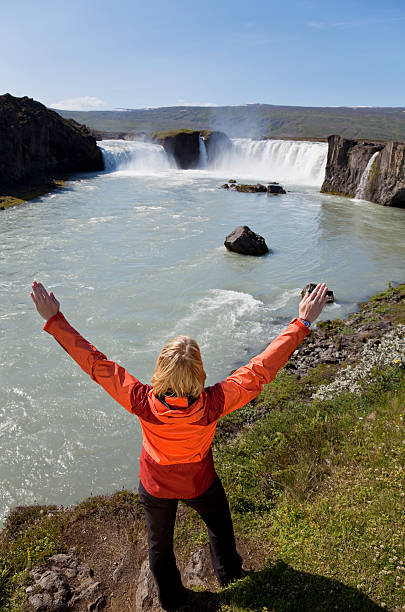 istock Woman Celebrating At Godafoss Waterfall, Iceland 92035793