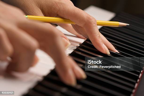 Womans Fingers With Pencil On Piano Keys Stock Photo - Download Image Now - Abstract, Art, Artist