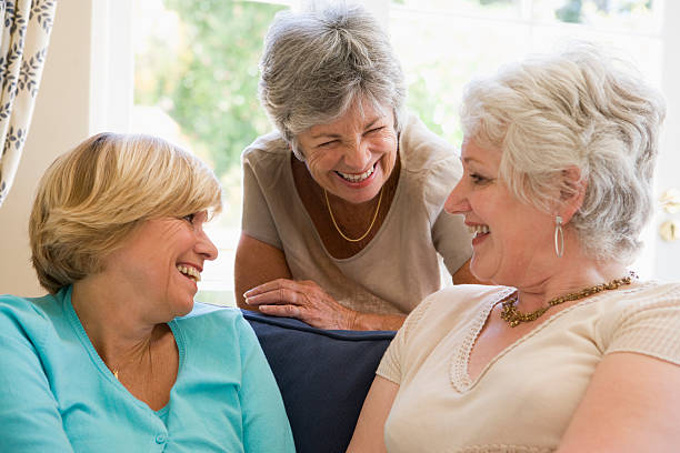 istock Three women in living room talking 92036007