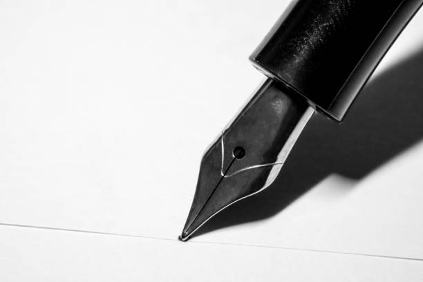 istock Black fountain pen with silver nib isolated on white background with path selection and copy space 920366120