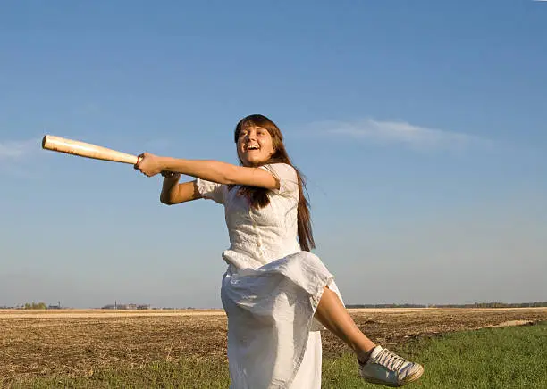 Photo of girl and baseball bat 2