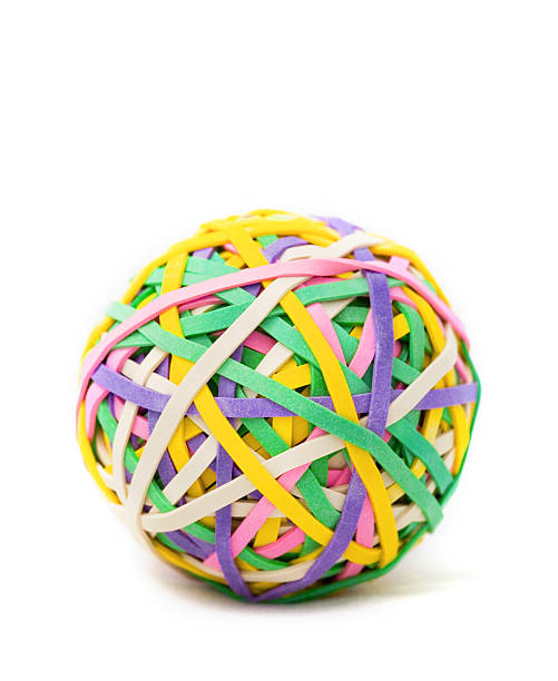 élastique de balle - rubber band rubber intertwined flexibility photos et images de collection