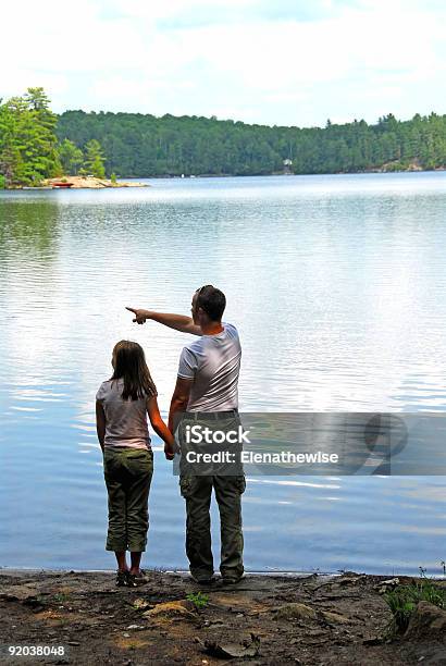 Father Daughter Lake Stock Photo - Download Image Now - Acute Angle, Adult, Aiming