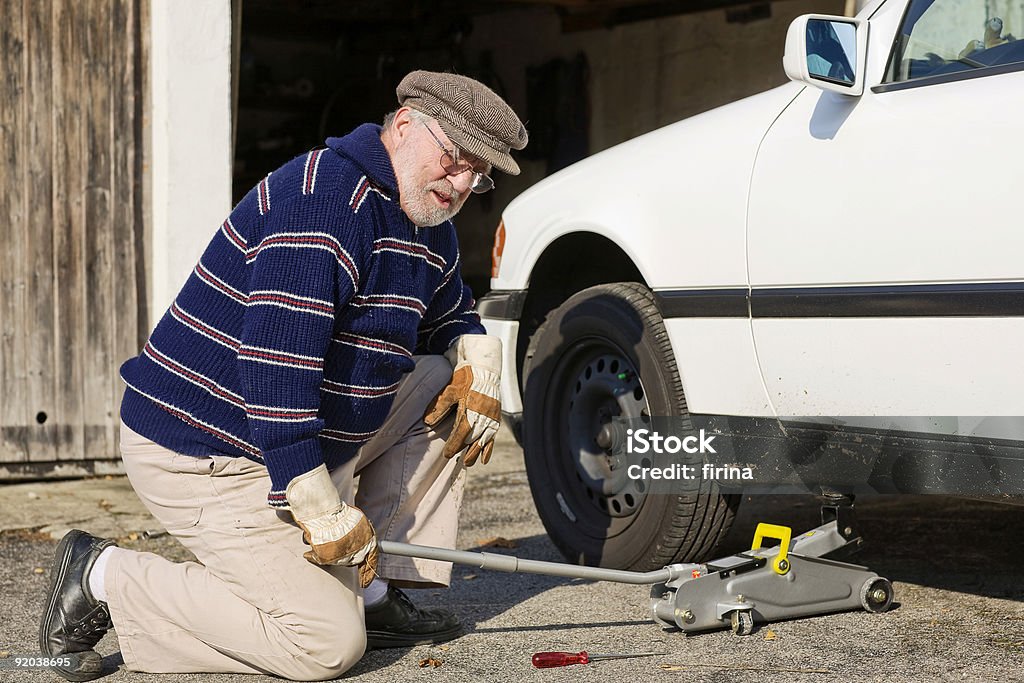 Changing tire  70-79 Years Stock Photo