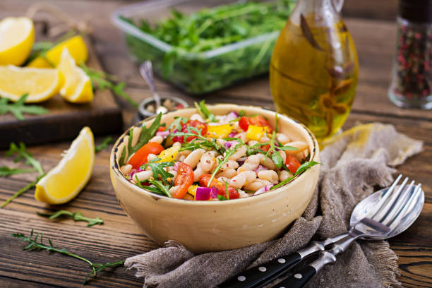 istock White bean cannellini salad. Vegan salad. Diet menu 920387476