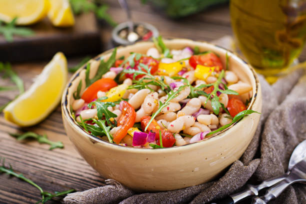 istock White bean cannellini salad. Vegan salad. Diet menu 920387486