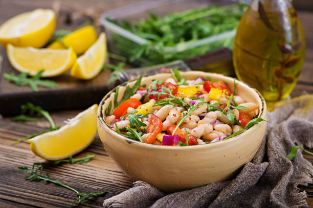 istock White bean cannellini salad. Vegan salad. Diet menu 920387492