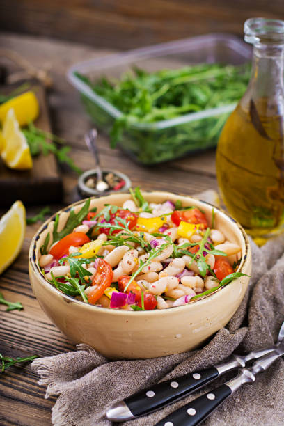 istock White bean cannellini salad. Vegan salad. Diet menu 920387498