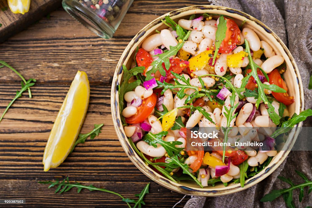 White bean cannellini salad. Vegan salad. Diet menu. Flat lay. Top view. Bean Stock Photo